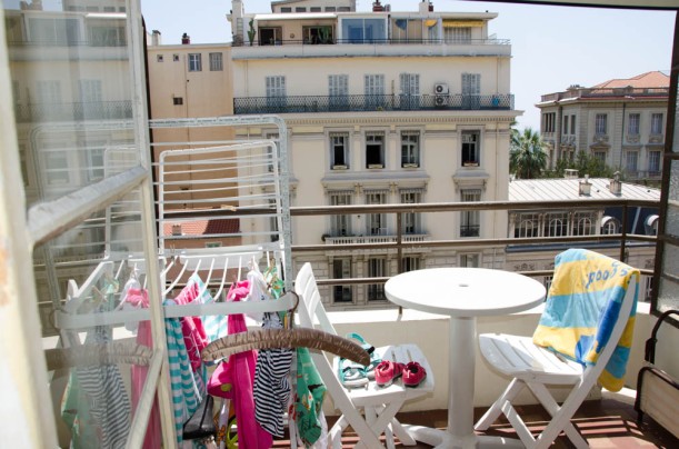 Warm Mediterranean breezes dry our clothes the old-fashioned way off the balcony of our apartment on Rue de France.